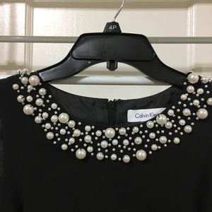 Super chic LBD with pearl collar
